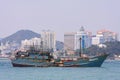 Old weathered fishing boat in coastal area of Xiamen, China